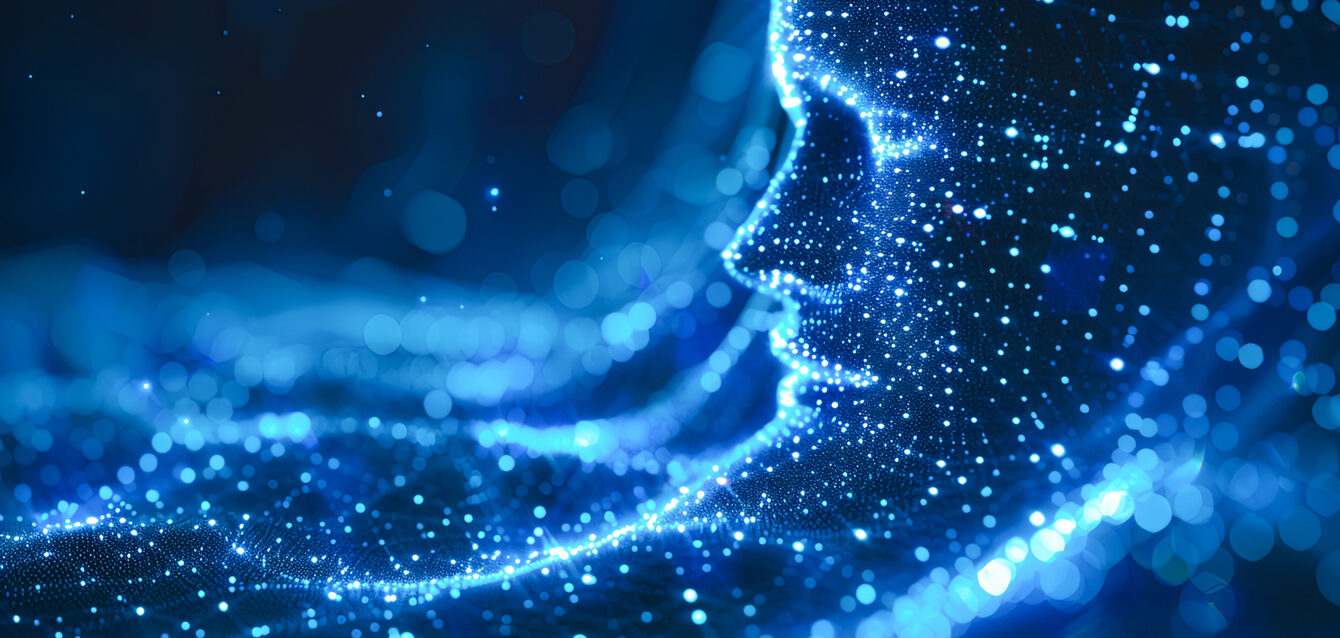 3d rendering of a female head made of glowing particles on a dark background